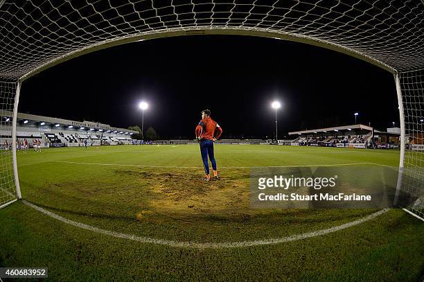 Arsenal goalkeeper Ryan Huddart warms up before the FA Youth Cup 3rd Round match between Arsenal and Reading at Meadow Park on December 19, 2014 in...