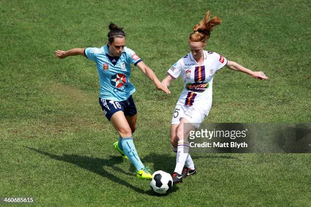 Emma Kete of Sydney and Shannon May of Perth compete for the ball during the round seven W-League match between Sydney FC and the Perth Glory at WIN...
