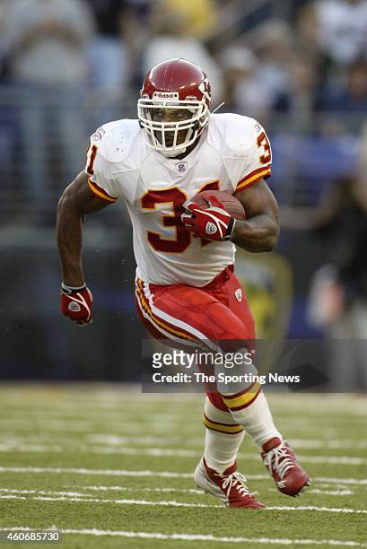 Priest Holmes of the Kansas City Chiefs runs with the ball during a game against the Baltimore Ravens on September 28, 2003 at M&T Bank Stadium in...