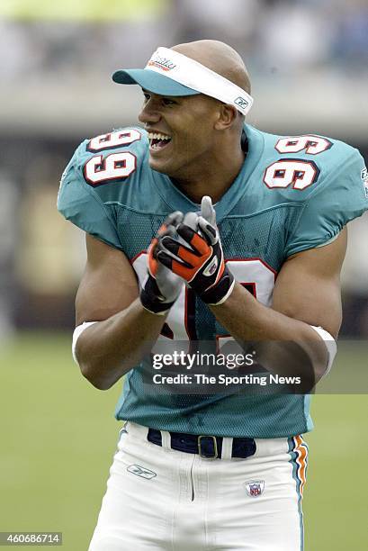 Jason Taylor of the Miami Dolphins reacts during a game against the Jacksonville Jaguars on October 12, 2003 at the Alltell Stadium in Jacksonville,...