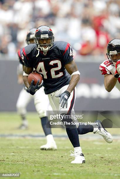 Marcus Coleman of the Houston Texans runs with the ball during a game against the Atlanta Falcons on November 30, 2003 at Reliant Stadium in Houston,...