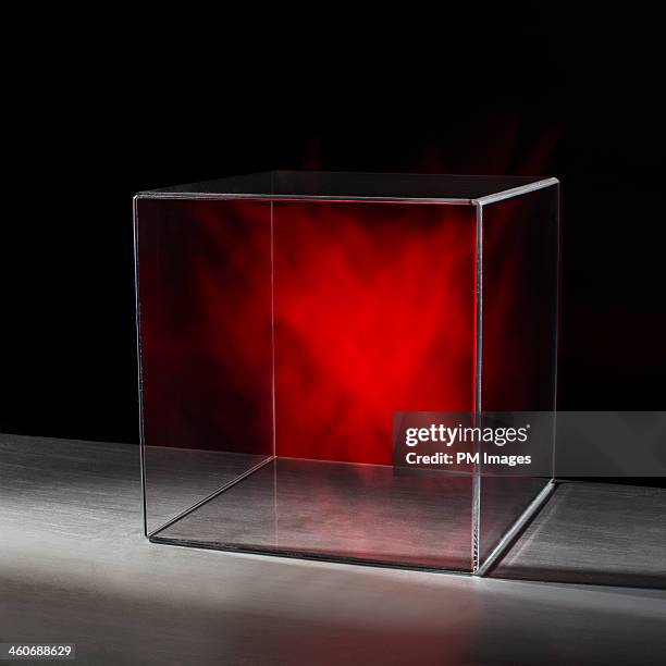 red mist in clear box - acrylic glass stock pictures, royalty-free photos & images