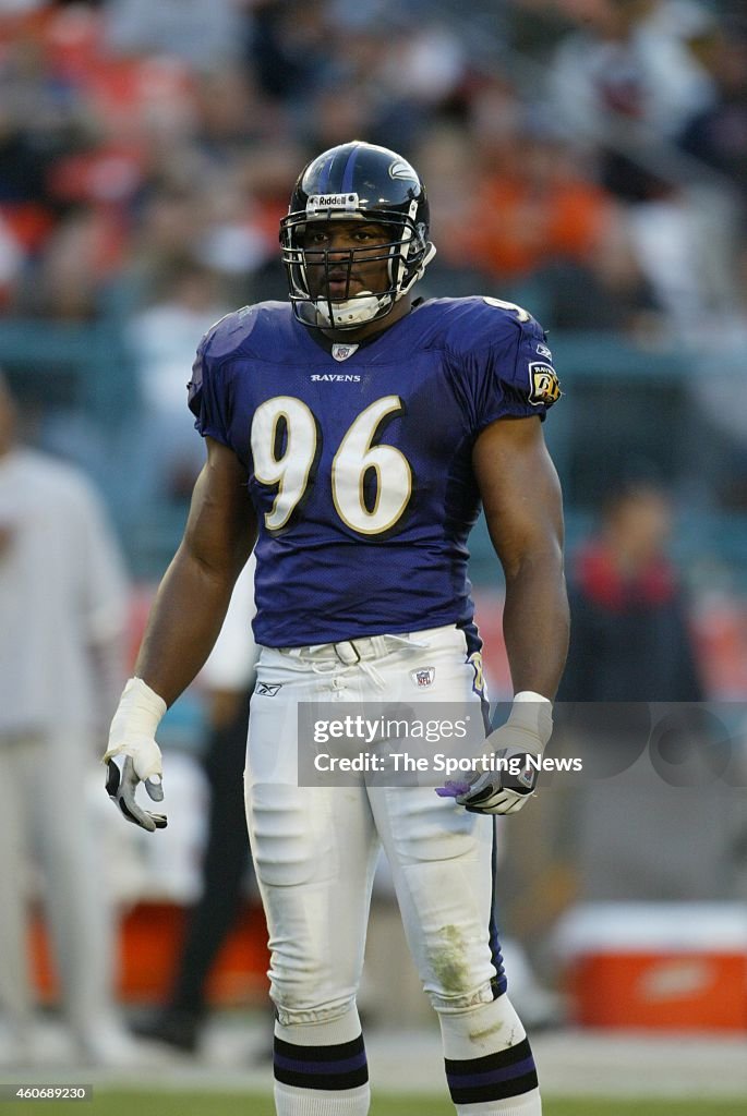Adalius Thomas of the Baltimore Ravens standing on the field during a ...