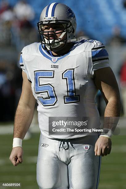 Dominic Raiola of the Detroit Lions participates in warm-ups before a game against the Carolina Panthers on December 21, 2003 at Erickson Stadium in...