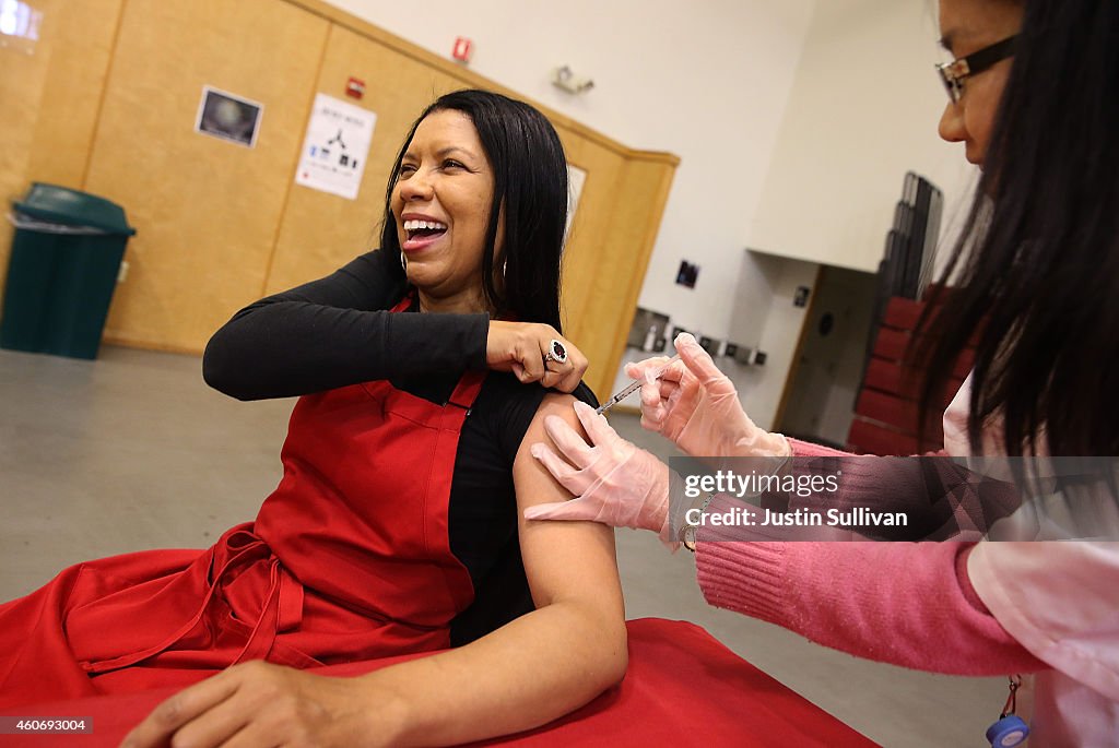 Oakland Residents Receive Free Flu Shots At Local Church