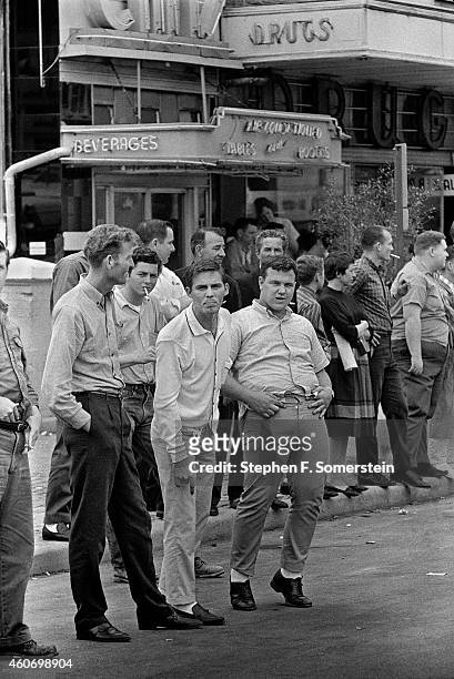 White hecklers yelling and gesturing obscenely at marchers. Selma to Montgomery Alabama Civil Rights March. On March 25, 1965 in Montgomery, Alabama.
