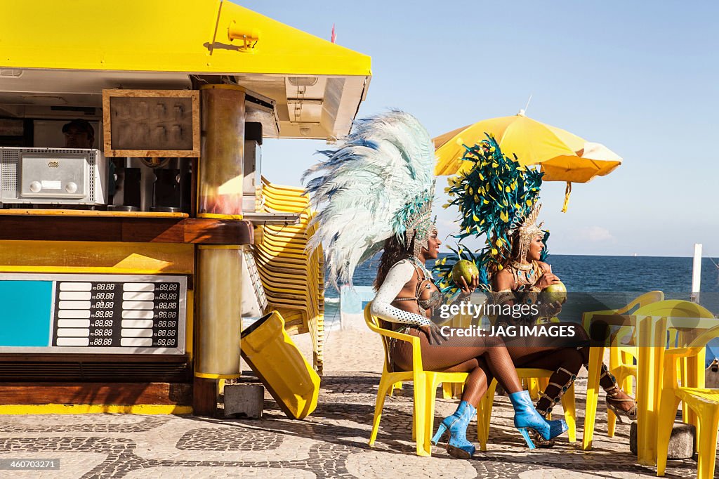 Samba dancers taking a break, Ipanema Beach, Rio De Janeiro, Brazil