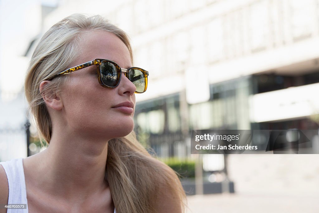 Young woman outside building