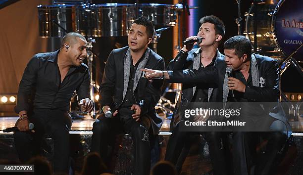 Singers Espinoza Paz, Jose Isidro Beltran Cuen, Vincen Melendres Garcia and Jorge Luis Medina Ramos of La Arrolladora Banda El Limon performs during...