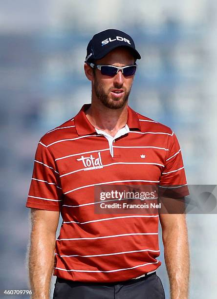 Christopher Cannon of England looks on during the third round of the Dubai Open at The Els Club Dubai on December 20, 2014 in Dubai, United Arab...