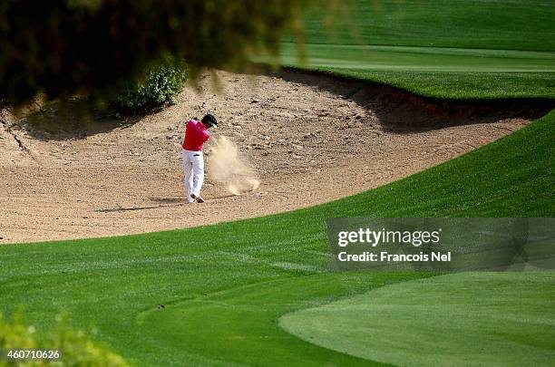 Unho Park of Australia plays his second shot on the 18th hole during the third round of the Dubai Open at The Els Club Dubai on December 20, 2014 in...