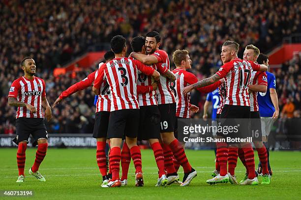 Graziano Pelle of Southampton celebrates with team mates after Romelu Lukaku of Everton scored an own goal during the Barclays Premier League match...