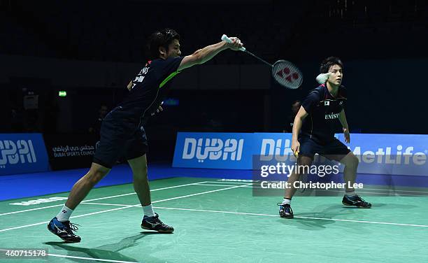 Hiroyuki Endo and Kenichi Hayakawa of Japan in action against Chai Biao and Hong Wei of China in the Mens Doubles during the BWF Destination Dubai...