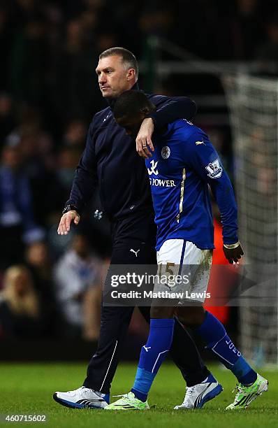 Nigel Pearson, manager of Leicester City looks dejected as he walks off the pitch with Jeffrey Schlupp of Leicester City during the Barclays Premier...