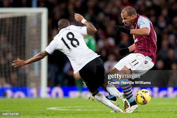 Gabriel Agbonlahor of Aston Villa fouls Ashley Young of Manchester United to get sent off during the Barclays Premier League match between Aston...