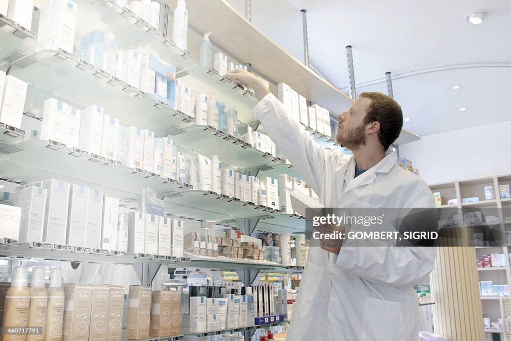 Pharmacist selecting drugs