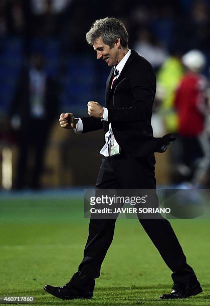 Auckland City's Spanish coach Ramon Tribulietx celebrates after defeating Cruz Azul during the FIFA Club World Cup third place football match at...