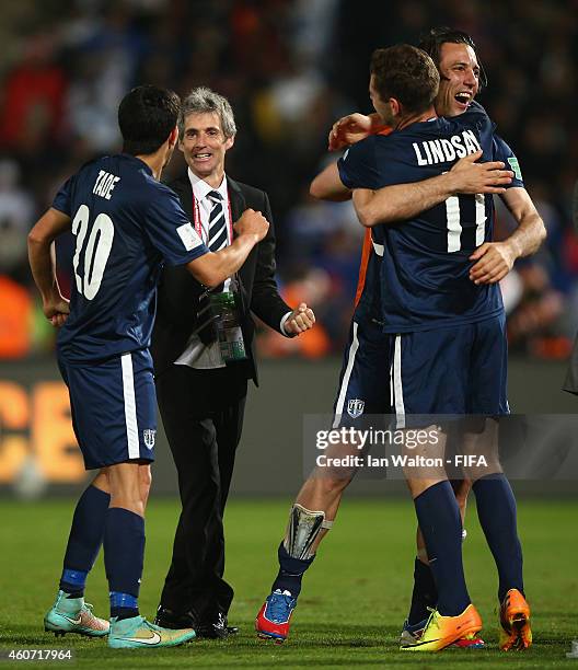 Head coach Ramon Tribulietx of Auckland City FC celebrates with Emiliano Tade after winning the FIFA Club World Cup 3rd Place match between Cruz Azul...