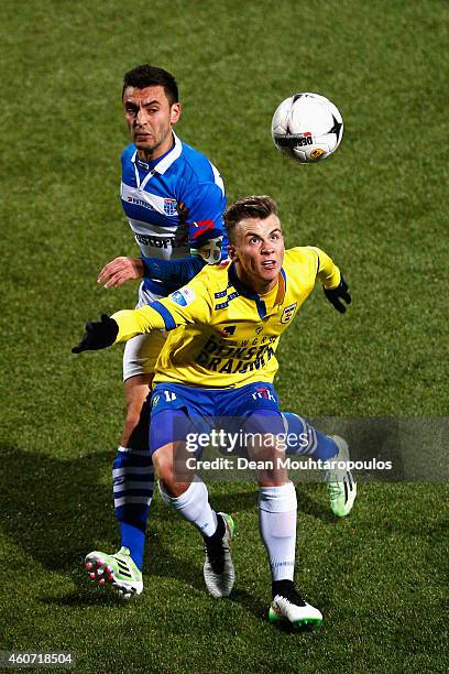 Albert Rusnak of Cambuur and Bram van Polen of Zwolle battle for the ball during the Dutch Eredivisie match between SC Cambuur and PEC Zwolle at...