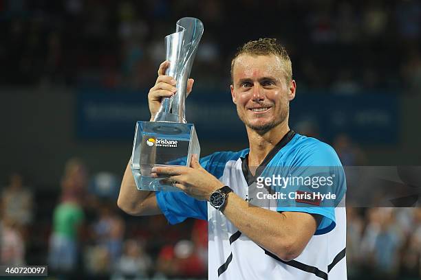 Lleyton Hewitt of Australia holds the winners trophy after winning the mens final match against Roger Federer of Switzerland during day eight of the...