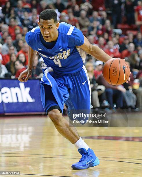 Kamryn Williams of the Air Force Falcons drives against the UNLV Rebels during their game at the Thomas & Mack Center on January 4, 2014 in Las...