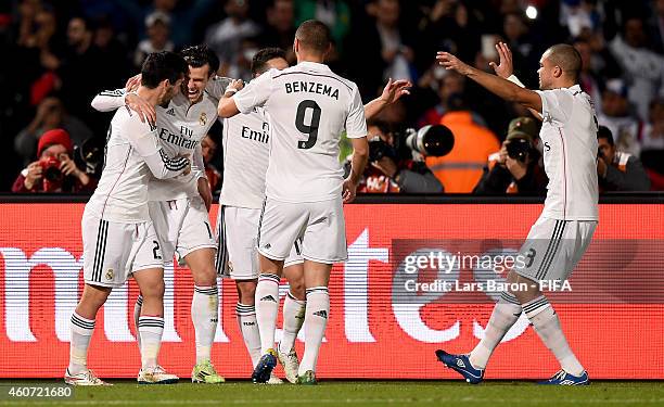 Gareth Bale of Real Madrid celebrates after scoring his teams second goal during the FIFA Club World Cup Final between Real Madrid and San Lorenzo at...