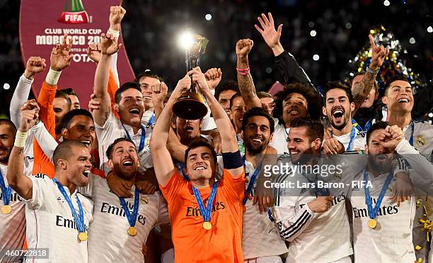 Iker Casillas of Real Madrid lifts the trophy after winning the FIFA Club World Cup Final between Real Madrid and San Lorenzo at Marrakech Stadium on...