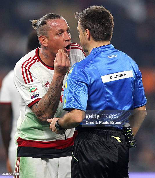 The referee Nicola Rizzoli reacts with Philippe Mexes of AC Milan during the Serie A match betweeen AS Roma and AC Milan at Stadio Olimpico on...