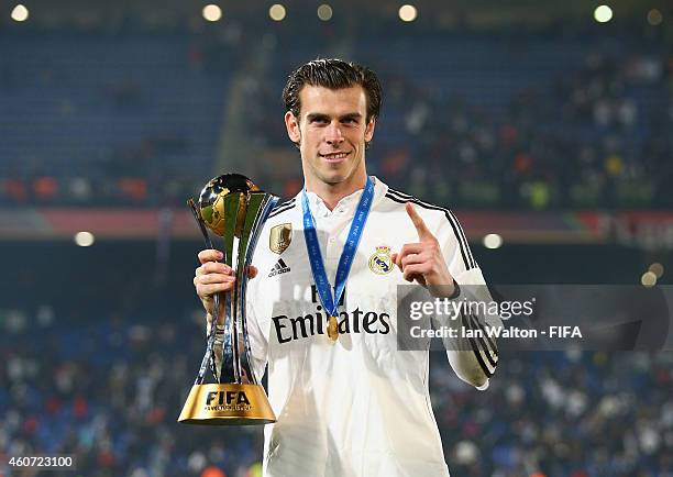 Gareth Bale of Real Madrid celebrates with the trophy after the FIFA Club World Cup Final between Real Madrid and San Lorenzo at Marrakech Stadium on...