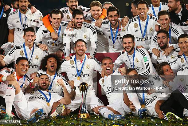 Real Madrid players celebrate with the trophy after the FIFA Club World Cup Final between Real Madrid and San Lorenzo at Marrakech Stadium on...
