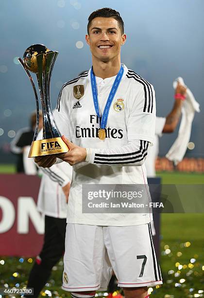 Cristiano Ronaldo of Real Madrid celebrates with the trophy after the FIFA Club World Cup Final between Real Madrid and San Lorenzo at Marrakech...