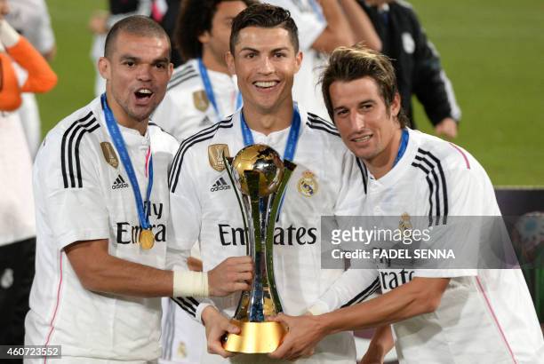 Real Madrid players celebrates the victory during the 2014 FIFA Club World Cup final football match against San Lorenzo at the Marrakesh stadium in...