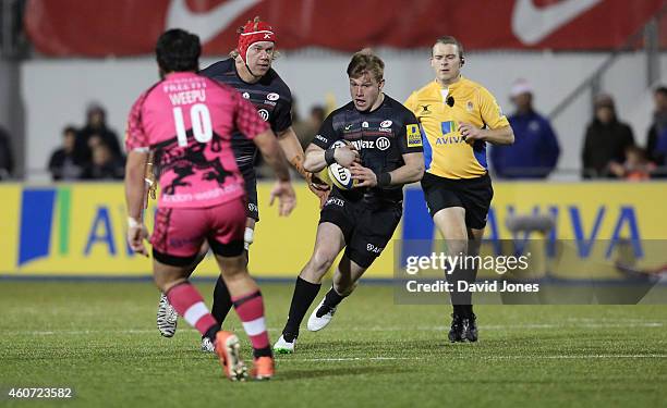 Nick Tompkins of Saracens attacks during the Aviva Premiership match between Saracens and London Welsh at the Allianz Park, on December 20, 2014 in...