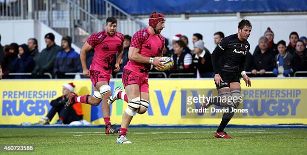 Peter Browne of London Welsh breaks away to set up a try against Saracens during the Aviva Premiership match between Saracens and London Welsh at the...