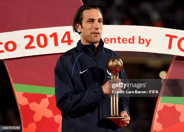 Ivan Vicelich of Auckland City FC recieves the adidas Bronce Ball after the FIFA Club World Cup Final between Real Madrid and San Lorenzo at...