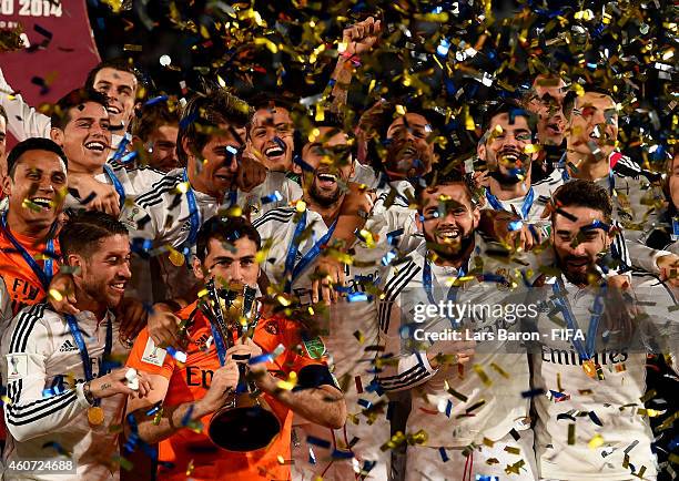 Iker Casillas of Real Madrid lifts the trophy after winning the FIFA Club World Cup Final between Real Madrid and San Lorenzo at Marrakech Stadium on...