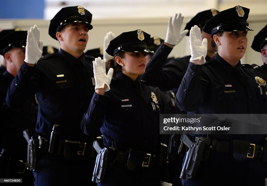 The Denver Police Department graduates 29 new officers to the police force on Friday, Dec. 19, 2014 at the police Training Academy in Denver.
