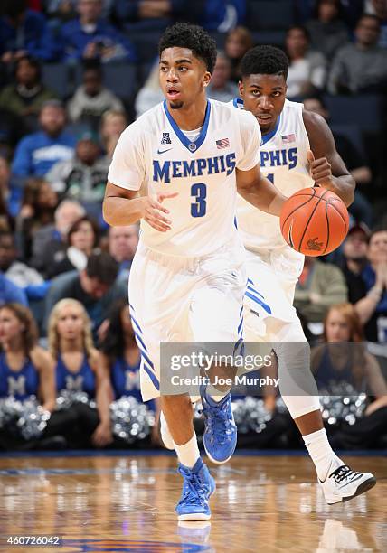 Pookie Powell of the Memphis Tigers dribbles the ball upcourt against the Oral Roberts Golden Eagles on December 20, 2014 at FedExForum in Memphis,...