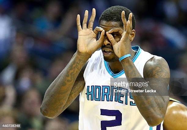 Marvin Williams of the Charlotte Hornets reacts after making a basket against the Utah Jazz during their game at Time Warner Cable Arena on December...