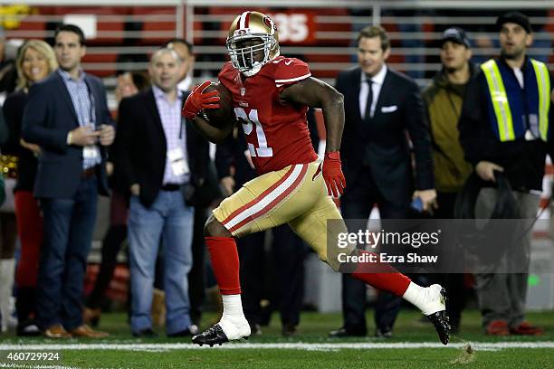 Running back Frank Gore of the San Francisco 49ers scores on a 52-yard touchdown run in the first quarter against the San Diego Chargers at Levi's...