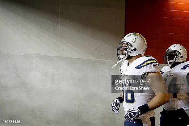 Jarret Johnson of the San Diego Chargers runs out of the tunnel before taking on the San Francisco 49ers at Levi's Stadium on December 20, 2014 in...