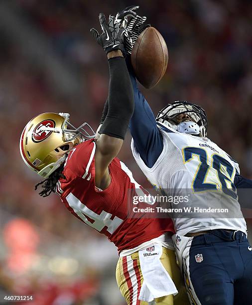 Brandon Lloyd of the San Francisco 49ers has a pass broken up by Brandon Flowers of the San Diego Chargersin the first quarter at Levi's Stadium on...