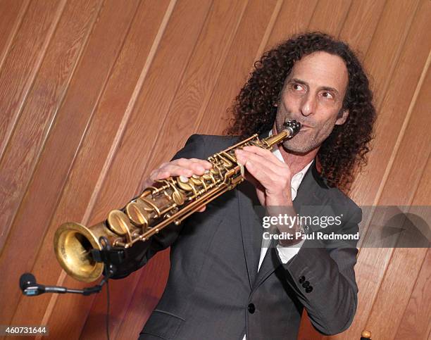 Musician Kenny G performs at the ISINA collaboration announcement at Capitol Recording Studios Holiday Party at Capitol Records Studio on December...