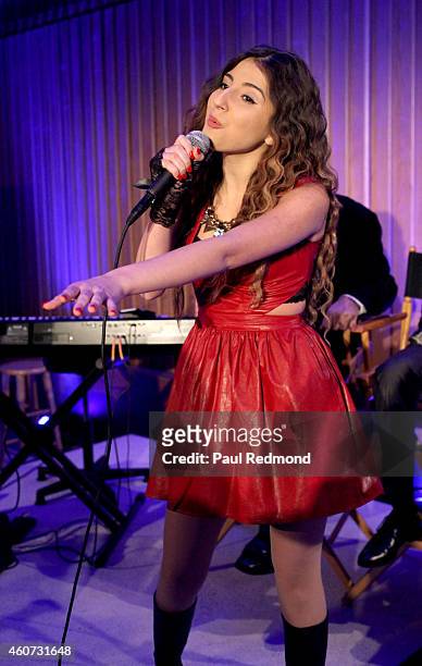 Singer Luara Melody performs at the ISINA collaboration announcement at Capitol Recording Studios Holiday Party at Capitol Records Studio on December...