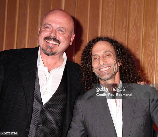 Producer Walter Afanasieff and musician Kenny G attends the ISINA collaboration announcement at Capitol Recording Studios Holiday Party at Capitol...