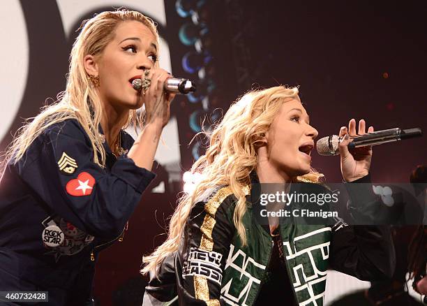 Rita Ora and Iggy Azalea perform during the 2014 Hot 99.5 Jingle Ball in Washington, DC.