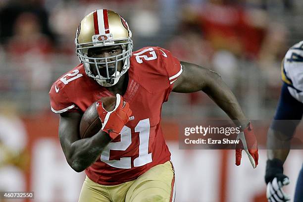 Running back Frank Gore of the San Francisco 49ers runs the ball in the first half against the San Diego Chargers at Levi's Stadium on December 20,...