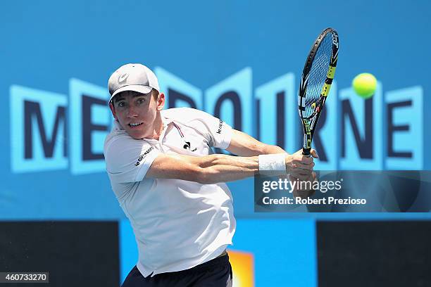 John-Patrick Smith of Australia plays a backhand in the final match against Jordan Thompson of Australia during the 2015 Australian Open play off at...