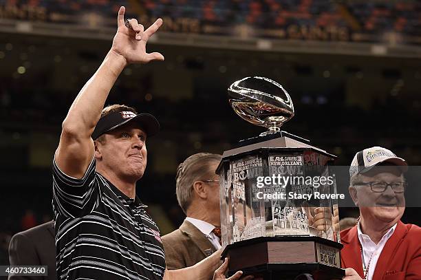 Head coach Mark Hudspeth of the Louisiana-Lafayette Ragin Cajuns celebrates following a victory over the Nevada Wolf Pack in the R&L Carriers New...