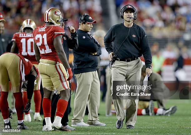 Head coach Jim Harbaugh of the San Francisco 49ers looks on in the second half while taking on the San Diego Chargers at Levi's Stadium on December...